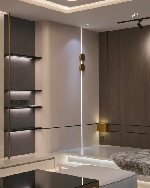 a living room and podium space defined by warm lighting and layered materials.#OneStepAtATime